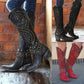 Abbott - Elegant boots with metal studs and solid heel